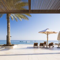 Infinity-Pool-Sunbeds-Al-Bustan-Palace-a-Ritz-Carlton-Hotel-Muscat-Oman